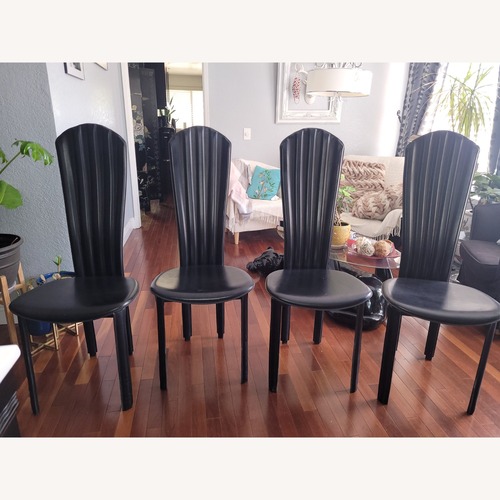 Used Vintage/Antique Finds Black Leather Dining Chairs for sale on AptDeco