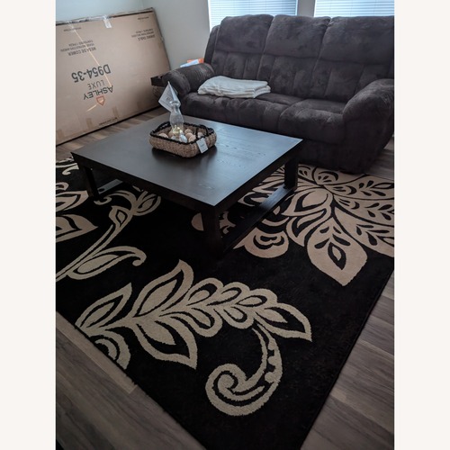 Used Dark Brown Area Rug 9' x 12' for sale on AptDeco