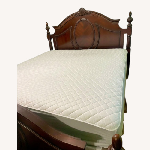Used Dark Brown Cherry Wood King Bed for sale on AptDeco