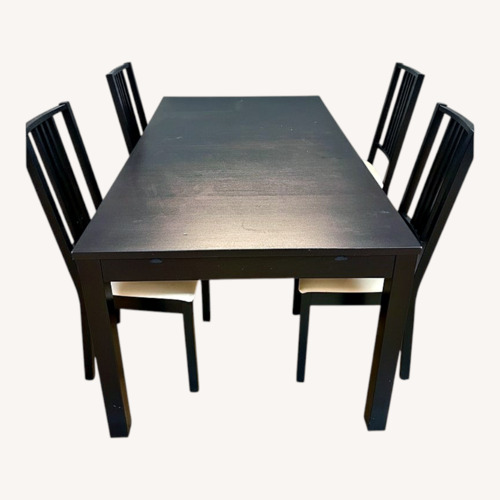 Used Extendable Black Wood Dining Table With 4 Chairs  for sale on AptDeco