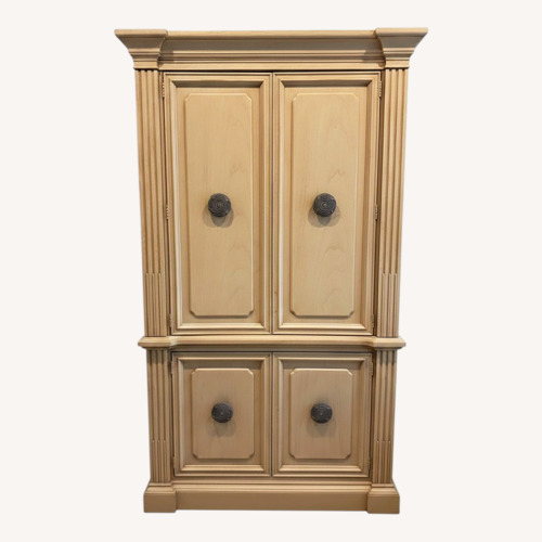 Used Stanley Furniture Light Brown Wood Armoire for sale on AptDeco
