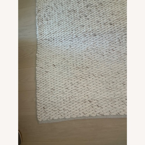 Used Nordic Knots Natural Wool Area Rug 6' x 9' for sale on AptDeco