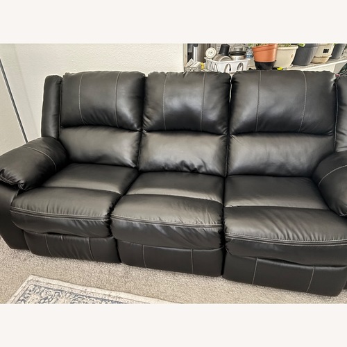 Used Ashley Furniture Caderwell Black Leather 3+ Seater Sofa for sale on AptDeco