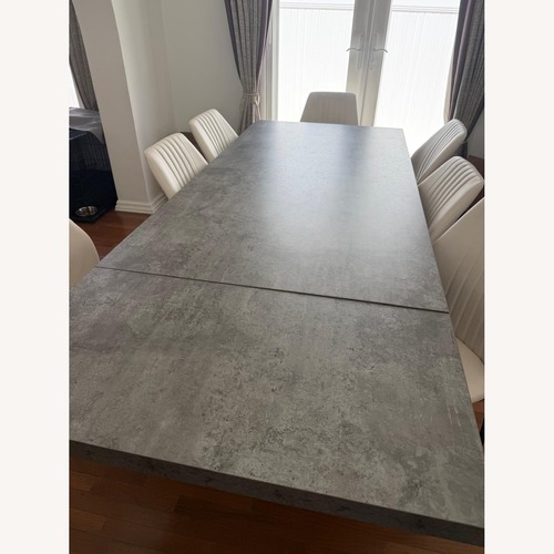 Used Light Gray Wood Dining Table for sale on AptDeco