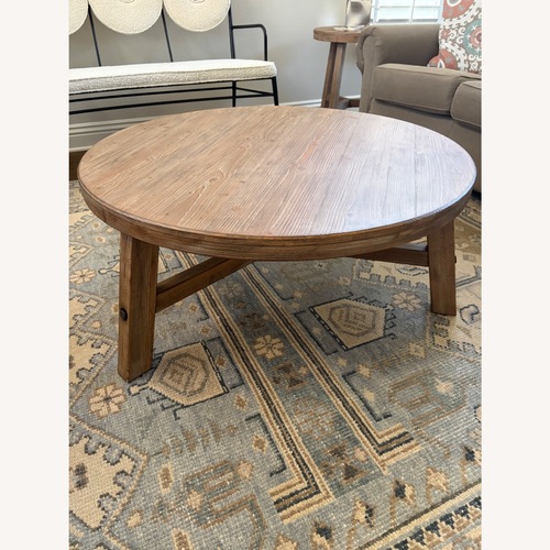 Used Pottery Barn Rustic Farmhouse Round Coffee Table  for sale on AptDeco