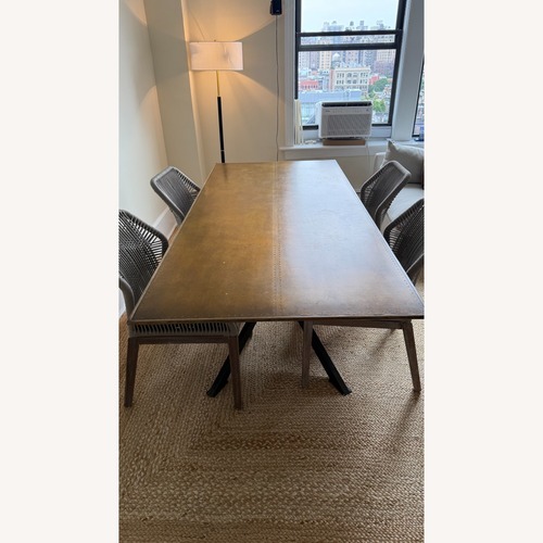 Used Fours Hands Spider Dining Table for sale on AptDeco