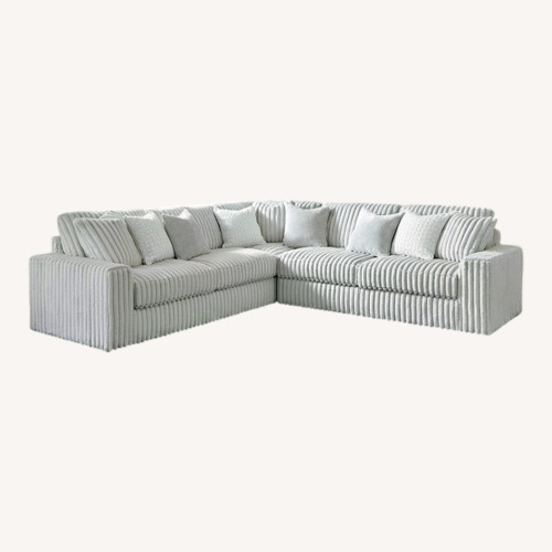 Used Ashley Furniture Light Gray 3+ Piece Sectional for sale on AptDeco