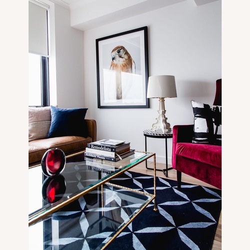 Used Mid Century Glass and Gold Leaf Coffee Table for sale on AptDeco
