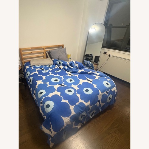 Used IKEA Full Sized Tarva Bed Frame (Pine) for sale on AptDeco