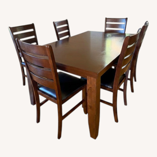 Used Dark Brown Wood Dining Set for sale on AptDeco