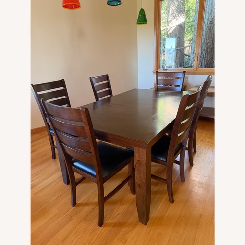 Used Dark Brown Wood Dining Set for sale on AptDeco