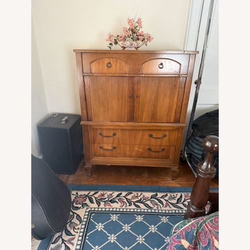Used Vintage/Antique Finds Dark Brown Wood Armoire for sale on AptDeco