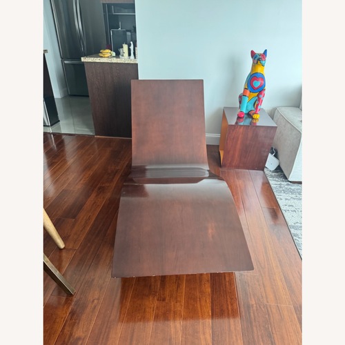 Used Dark Brown Wood Accent Chair for sale on AptDeco