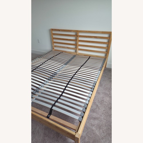 Used IKEA TARVA Natural Wood Queen Bed for sale on AptDeco