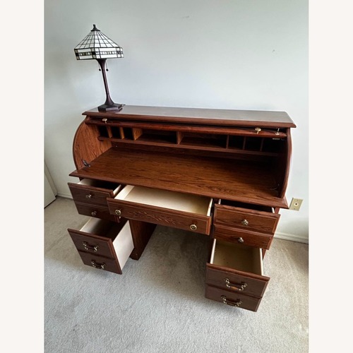 Used Vintage/Antique Dark Brown Wood Desk for sale on AptDeco