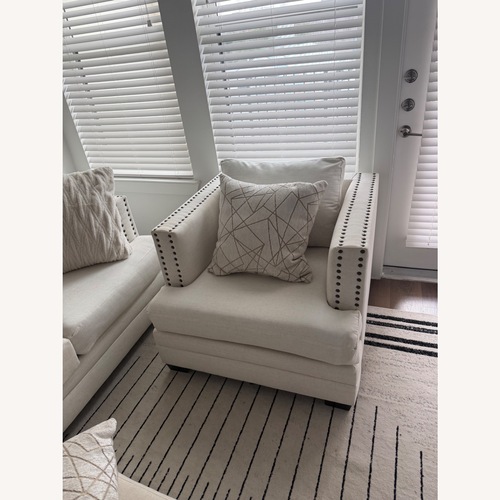 Used Living Spaces White Fabric Accent Chair for sale on AptDeco