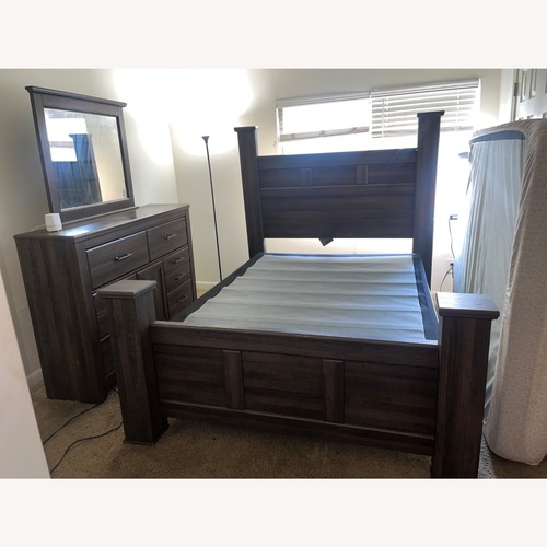 Used Dark Brown Wood Queen Bed for sale on AptDeco