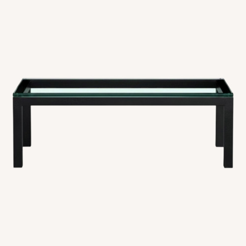 Used Crate & Barrel Parsons Black Glass Coffee Table for sale on AptDeco