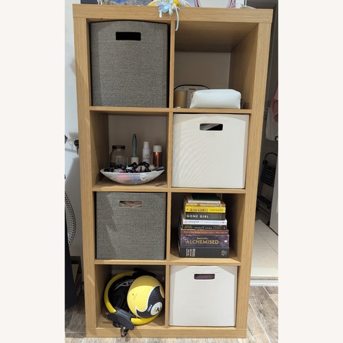 Used Light Brown Wood Bookcase 8 Cubes for sale on AptDeco