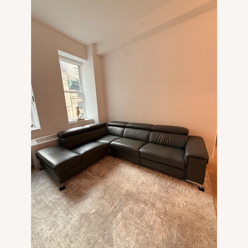 Used J&M Furniture Dark Gray Leather 2 Piece Sectional for sale on AptDeco