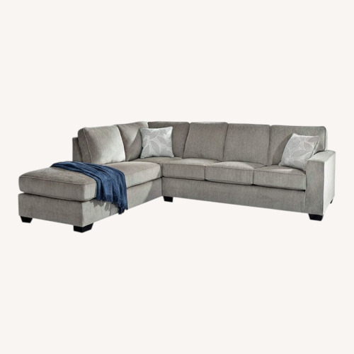 Used Raymour & Flanigan Light Gray 2 Piece Sectional for sale on AptDeco