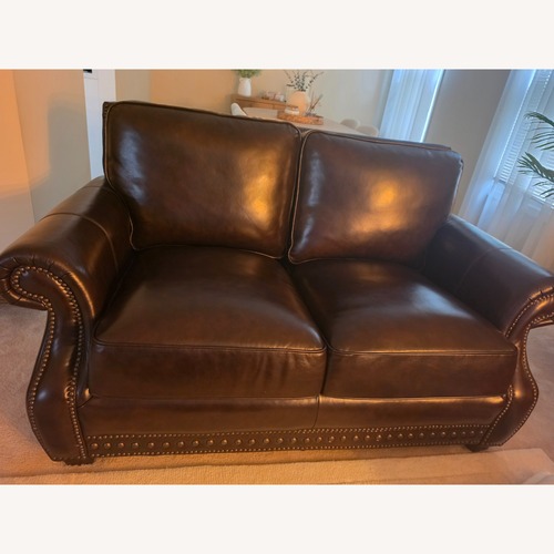 Used The Roomplace Dark Brown Leather 2 Seater Sofa for sale on AptDeco