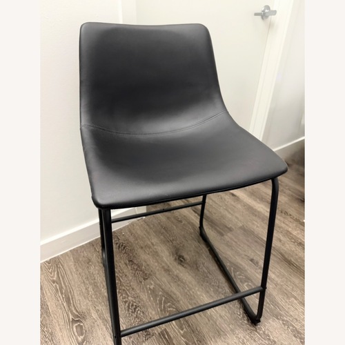 Used Signature Design Set of Black Stools for sale on AptDeco