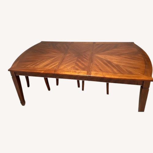 Used Dark Brown Wood Dining Table for sale on AptDeco