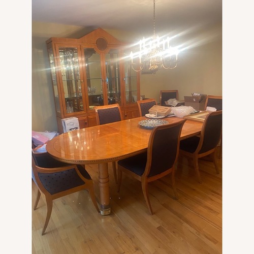 Used Light Brown Wood Dining Table for sale on AptDeco