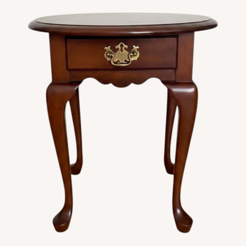 Used Vintage/Antique Dark Brown Wood Side Table for sale on AptDeco