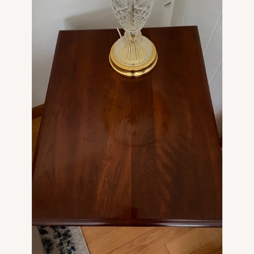 Used Vintage/Antique Dark Brown Wood Side Table for sale on AptDeco