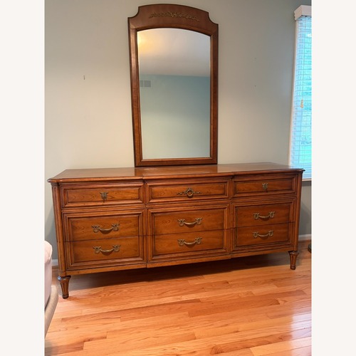 Used Vintage/Antique Finds Dark Brown Wood Dresser for sale on AptDeco