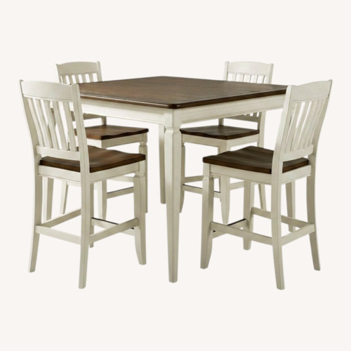 Used Rooms To Go Dark Brown Wood Dining Table for sale on AptDeco