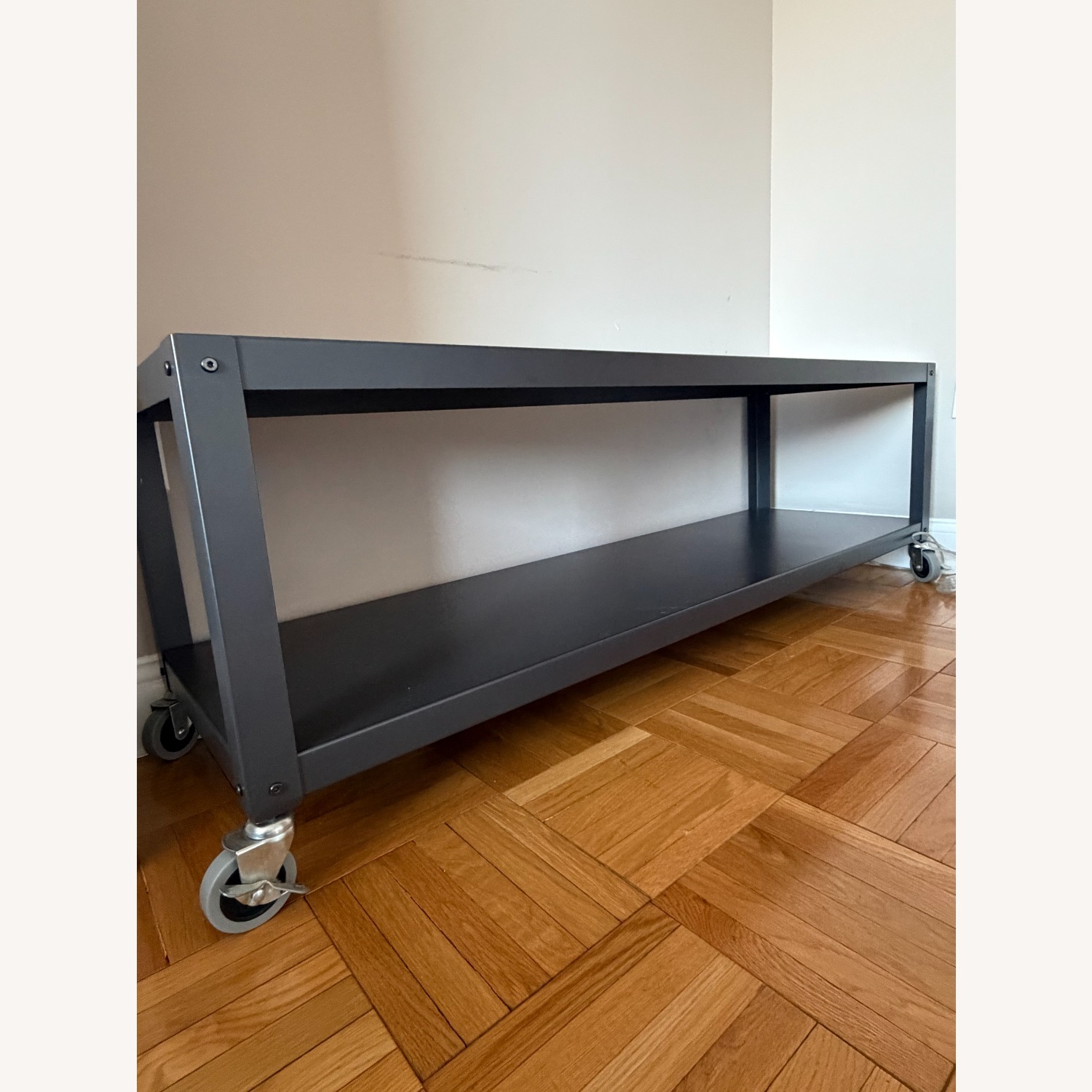 CB2 Black Metal Media Storage With Wheels - image-3