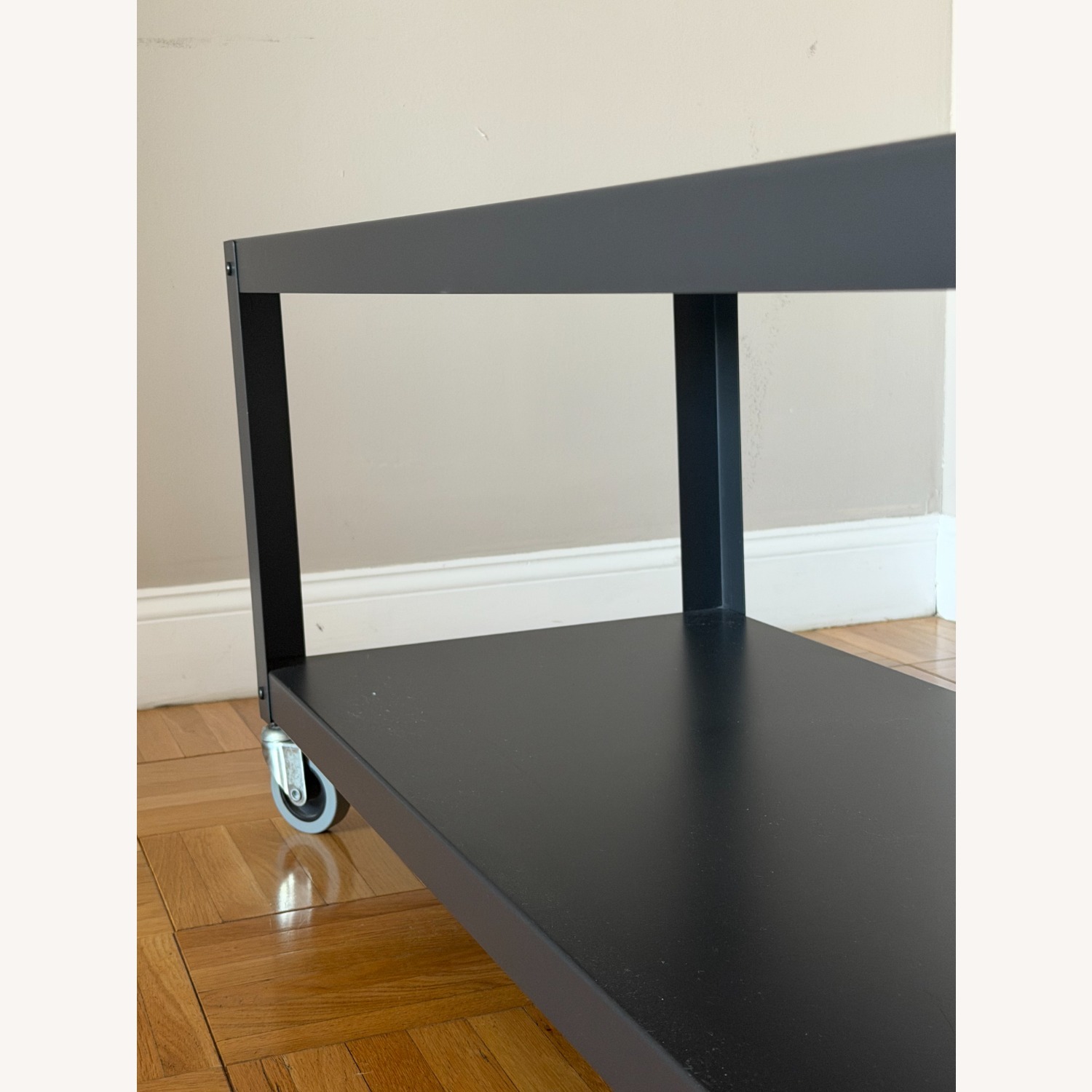 CB2 Black Metal Media Storage With Wheels - image-2