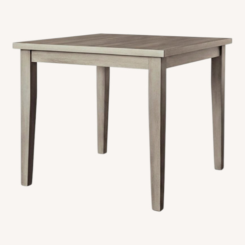 Used Ashley Light Gray Dining Table for sale on AptDeco