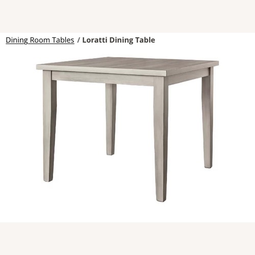 Used Ashley Light Gray Dining Table for sale on AptDeco