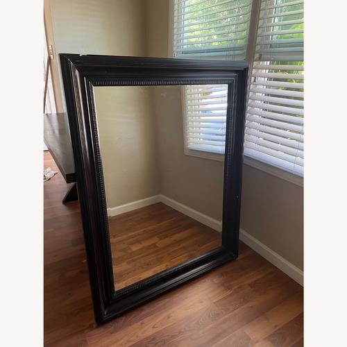 Used Gallery Furniture Dark Brown Stone Wall Mirror for sale on AptDeco