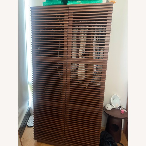 Used Design Within Reach Dark Brown Wood Armoire for sale on AptDeco