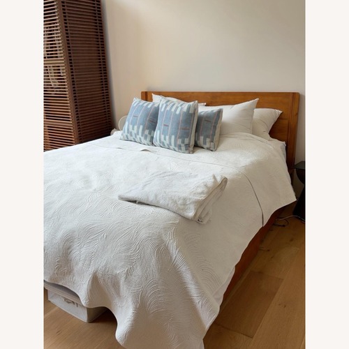 Used Thuma Dark Brown Wood Queen Bed for sale on AptDeco