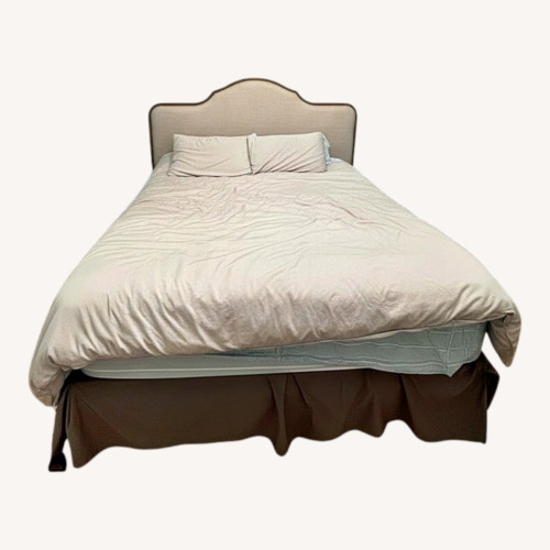 Used King Bed Frame with Fabric Backing for sale on AptDeco