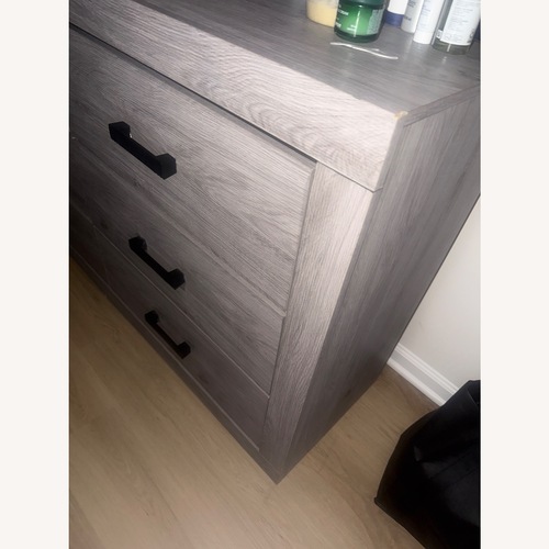 Used Raymour & Flanigan Dresser With Mirror for sale on AptDeco