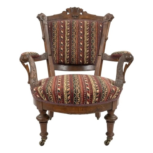Used Carved Wood Armchair With Casters for sale on AptDeco