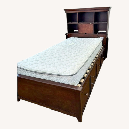Used Jordan's Furniture Dark Brown Wood Twin Bed for sale on AptDeco