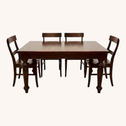 Used Pottery Barn Dark Brown Wood Dining Table for sale on AptDeco