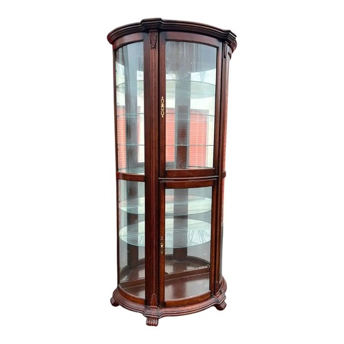 Used Pulaski Bowed Glass Illuminated Curio Cabinet for sale on AptDeco