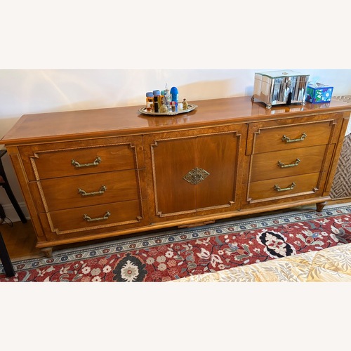 Used Vintage/Antique Finds Light Brown Wood Dresser for sale on AptDeco