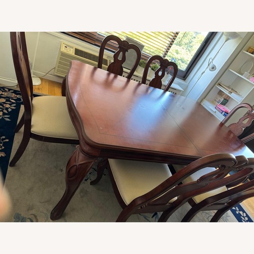 Used Macy's Bordeaux Dining Set  for sale on AptDeco