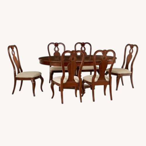 Used Macy's Bordeaux Dining Set  for sale on AptDeco