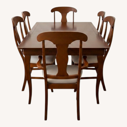 Used The Door Store 7pc Wood Dining Set W Leaf for sale on AptDeco